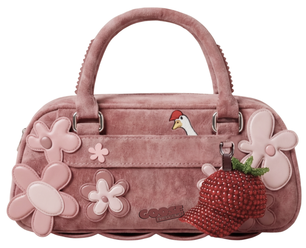 Pink suede handbag with flower appliqués and a crystal strawberry charm
